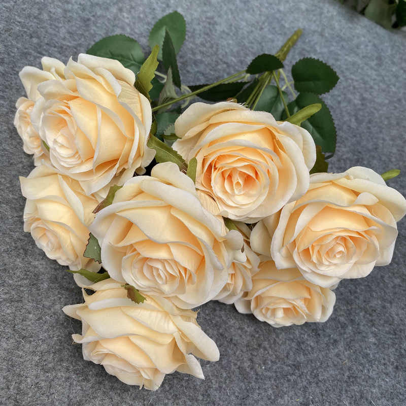 Faux flowers with different colours. 7 heads
