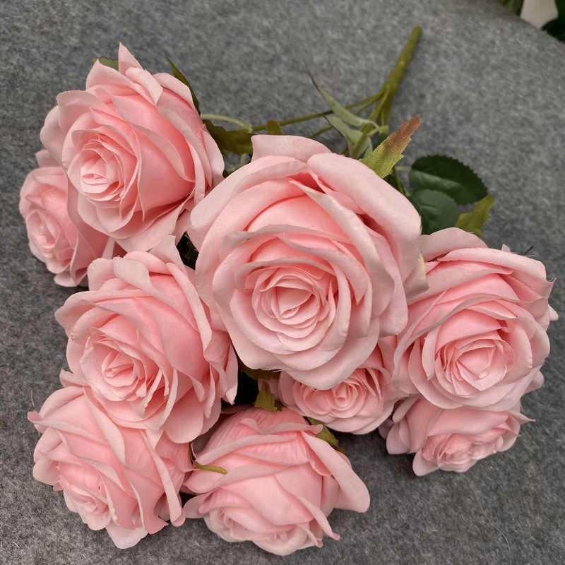 Faux flowers with different colours. 7 heads