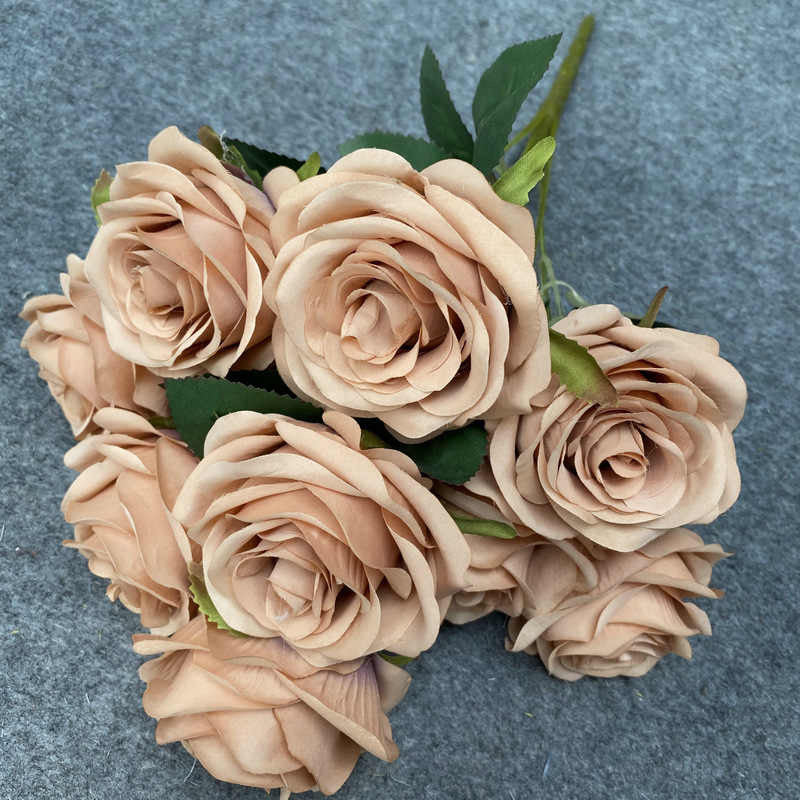 Faux flowers with different colours. 7 heads
