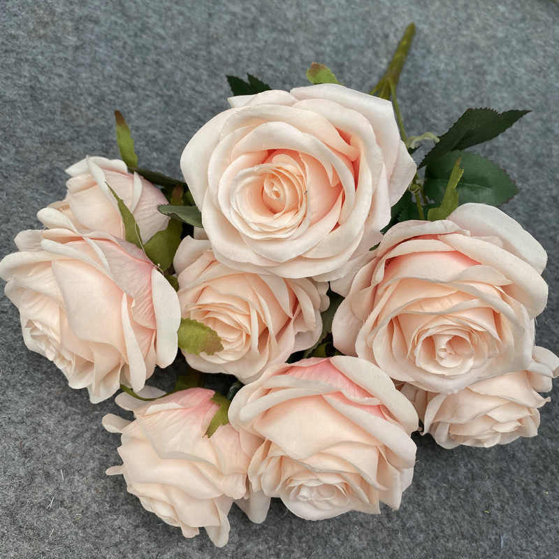 Faux flowers with different colours. 7 heads