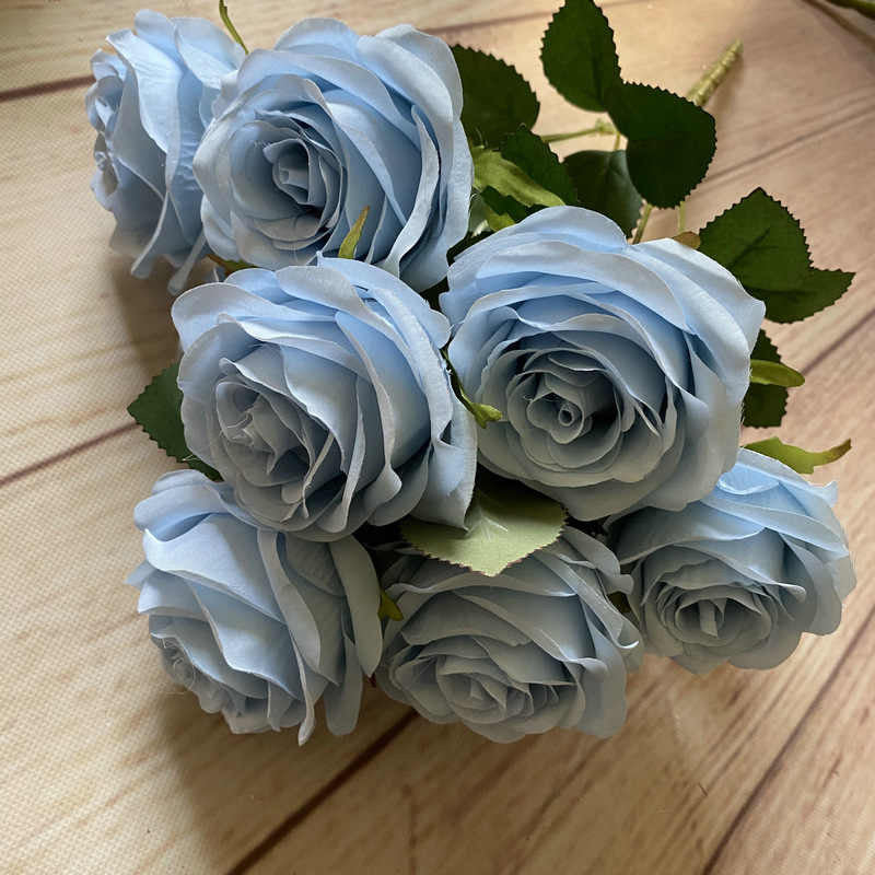 Faux flowers with different colours. 7 heads