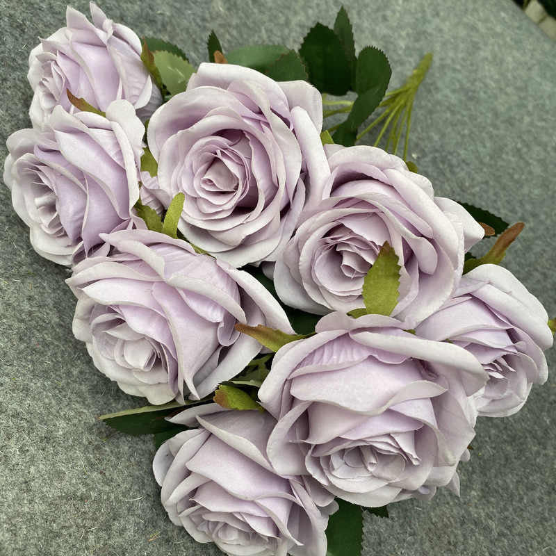 Faux flowers with different colours. 7 heads