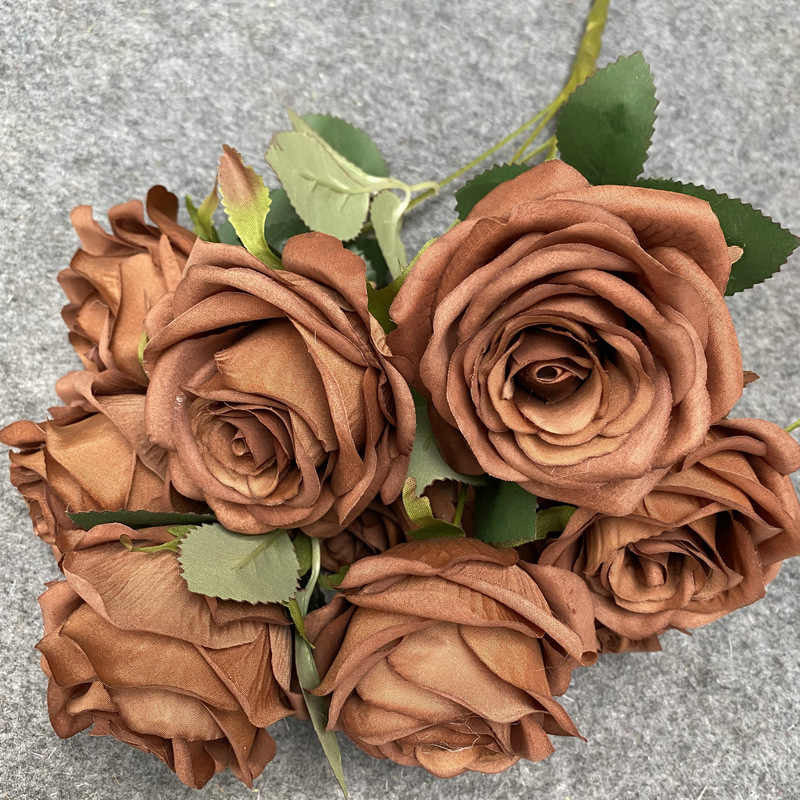 Faux flowers with different colours. 7 heads