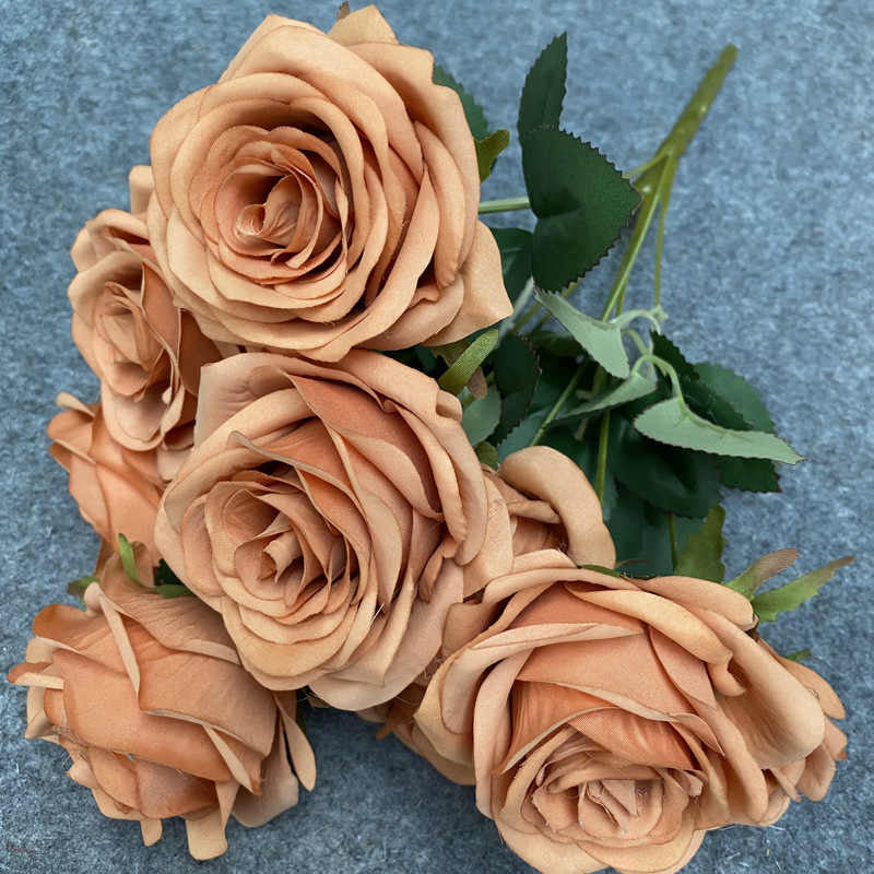 Faux flowers with different colours. 7 heads