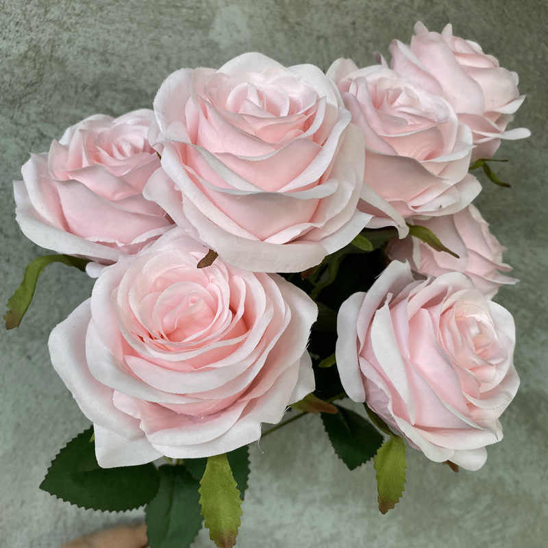 Faux flowers with different colours. 7 heads