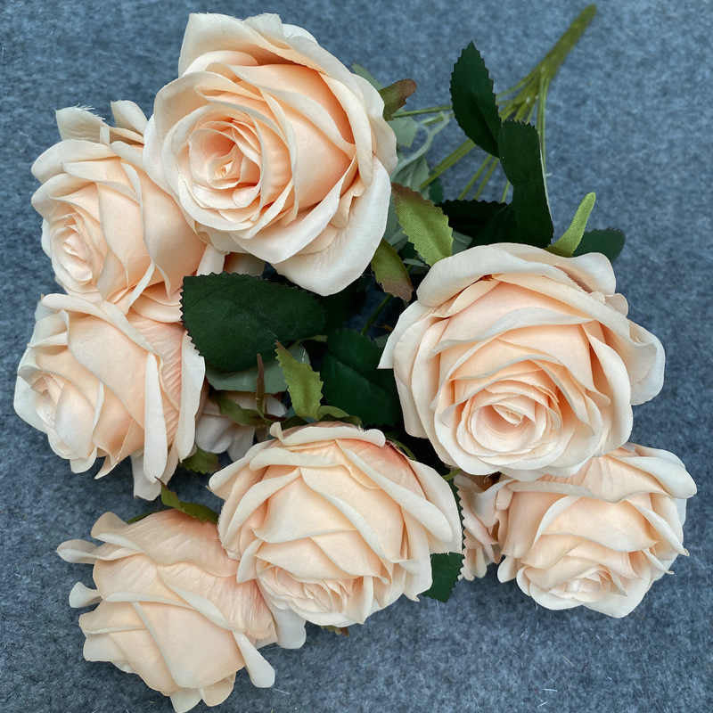 Faux flowers with different colours. 7 heads
