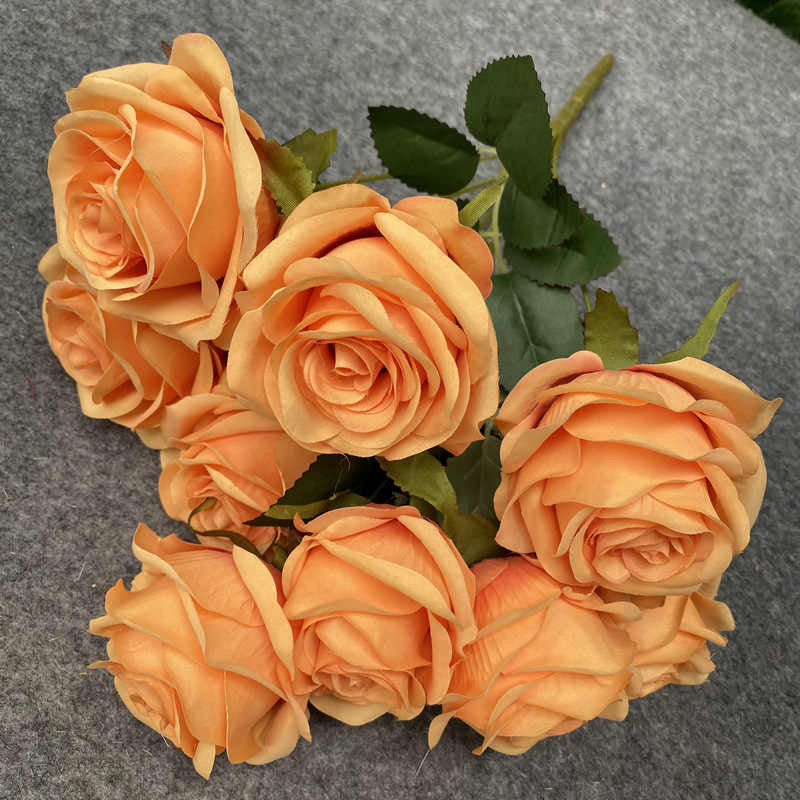 Faux flowers with different colours. 7 heads